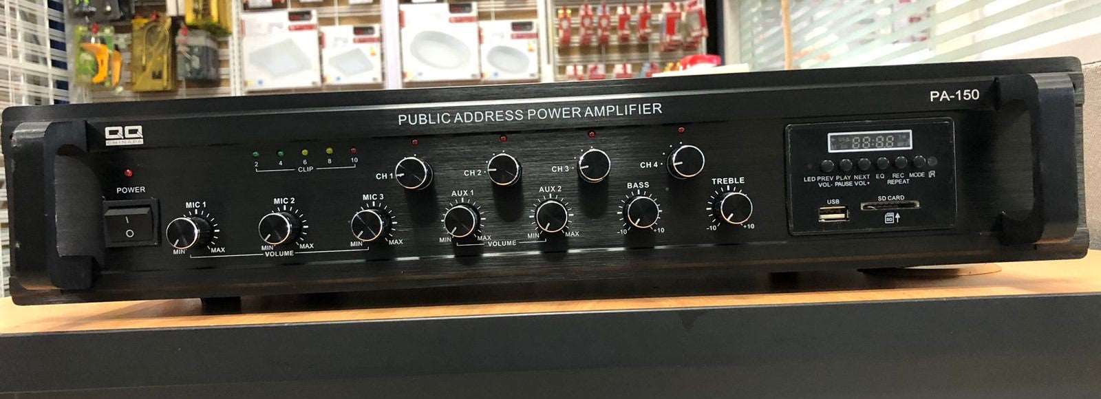 Amplificador de PA de 150W, 4 zonas, 70-100V, USB/ SD/ FM/ Bluetooth, Pantalla LCD, control remoto, montaje en rack ó sobremesa – PA-150